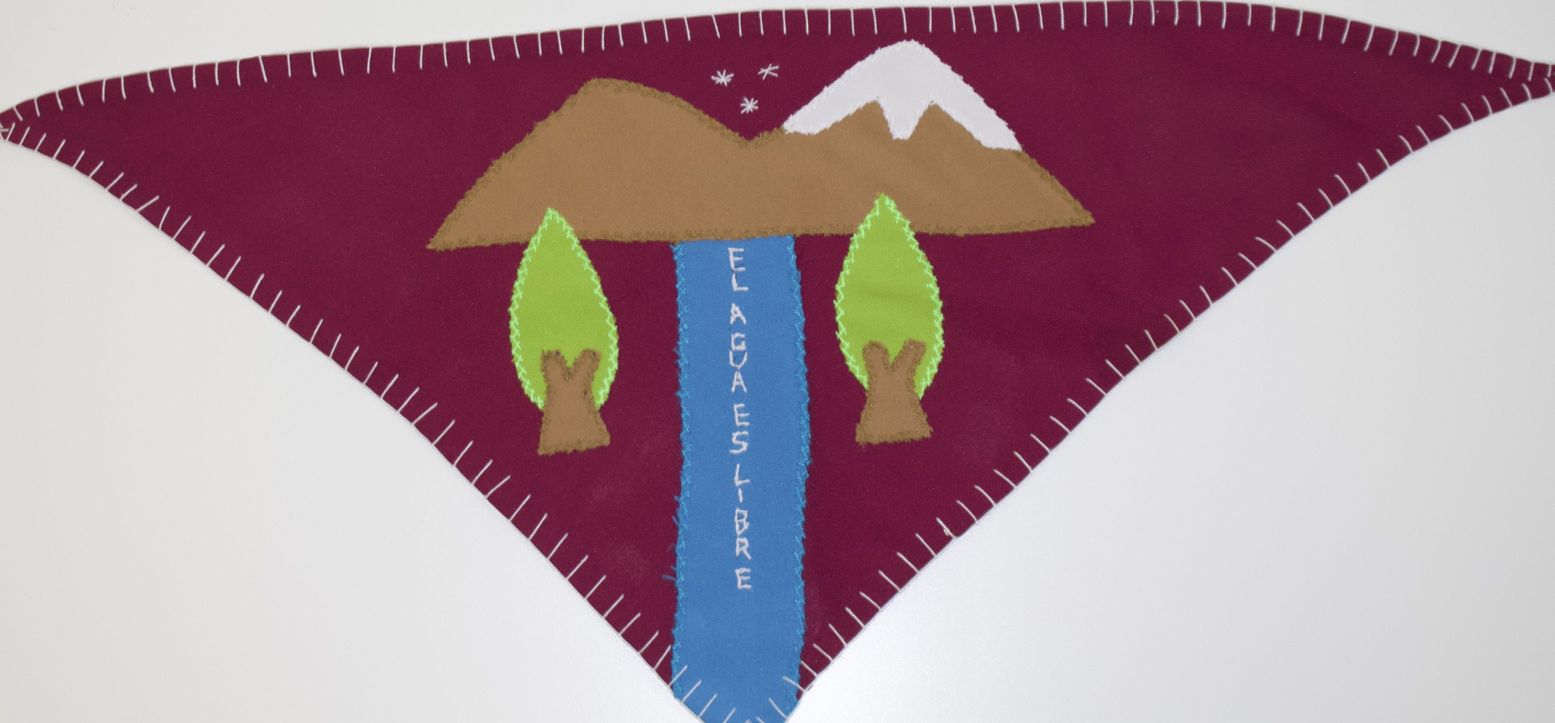 Image: Tina. 2020. Water is free/ agua es libre. 40 cm (h) x 52 cm (w) scraps of material sown onto cotton cloth. Location: Nicholas Garcia Johnson. Photographer: Nikola Garcia Johnson. Provenance: Lo Hermida Arpilleristas, Chile. All rights Reserved